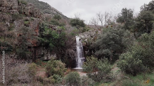 Serene waterfall on a mountain nature trail