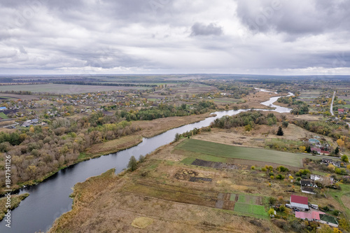 Aerial view of Ros winding river through rural landscape, Ukraine.