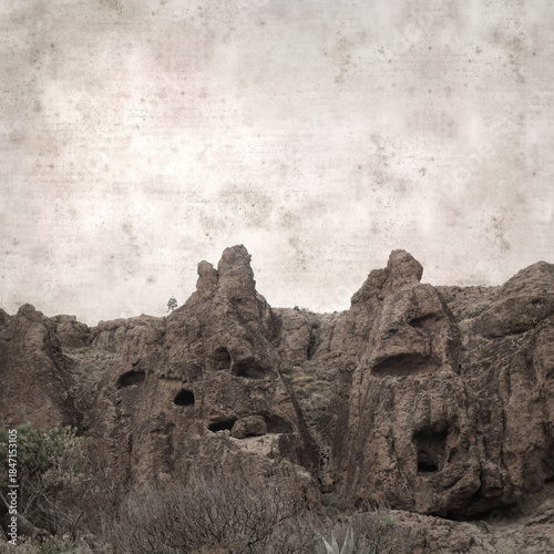 textured stylish old paper background, square, with landscape of central Gran Canaria, route to Ventana de Bentayga