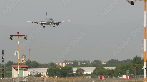 Jet aircraft approaching landing. Passenger plane arriving. Travel concept
