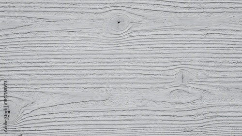 A close-up, detailed view of a weathered, light gray wooden plank with prominent grain patterns and knots.
