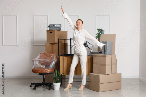Happy young businesswoman i...
