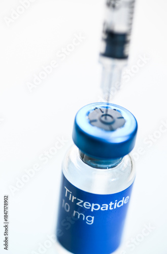 Close up of Tirzepatide Vial and Single Use Insulin Syringe