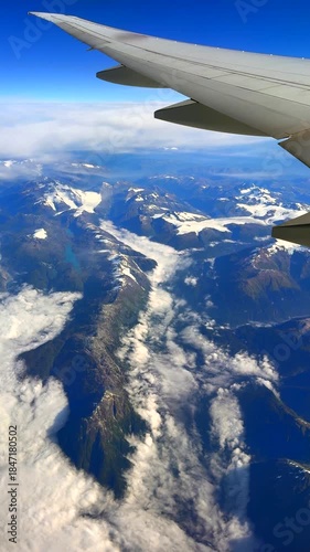 Rugged Coast Mountains viewed from airplane. Several glaciers can be seen with these steep ands remote mountains. 