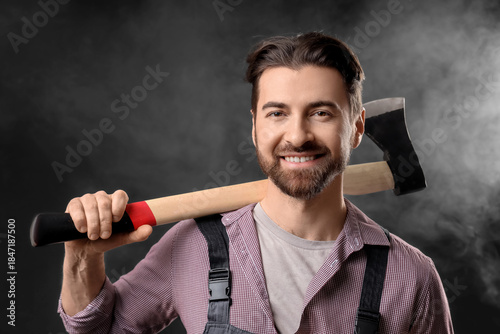 Handsome lumberjack with ax...