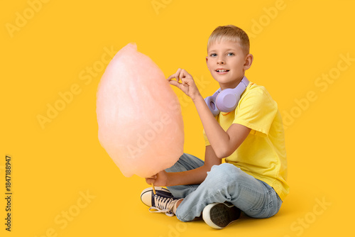 Teen boy with cotton candy ...