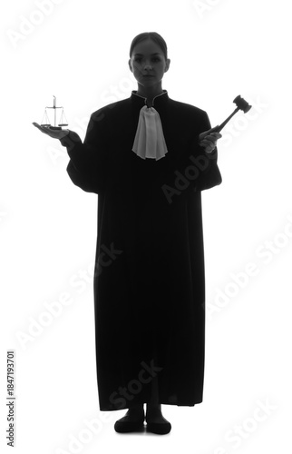 Silhouette of female judge with justice scales and gavel on white background