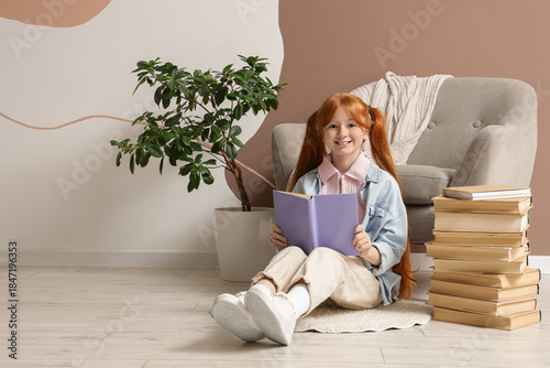 Cute redhead girl with stac...