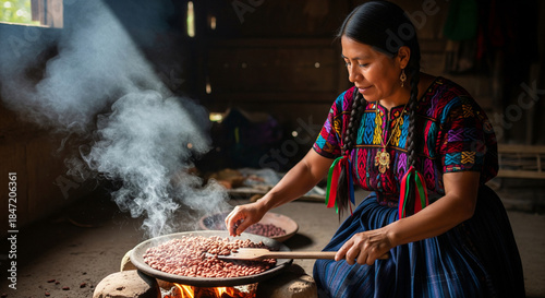 Mayan cacao roasting shows woman tossing cacao beans on hot comal in traditional setting