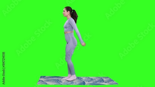 Canvas-taulu Young woman workout by practicing split squat on the yoga mat on the chroma key