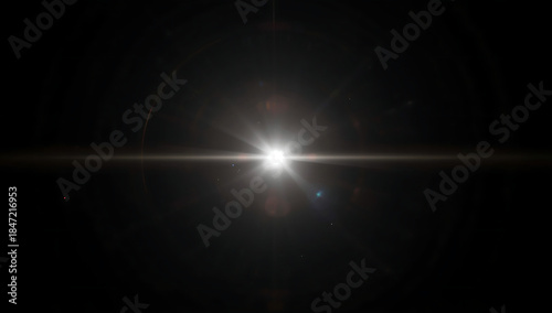 Bright Lens Flare Against Dark Background with Starburst Effect