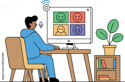 Man on video call using computer at desk in home office