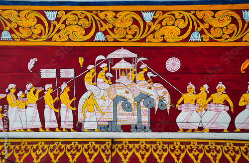 Beautiful fresco depicting the Esala Perahera procession of the sacred tooth in a golden casket with song and dance at the Temple of the Tooth,Sri Dalada Maligawa,built in 1595 in Kandy,Sri Lanka