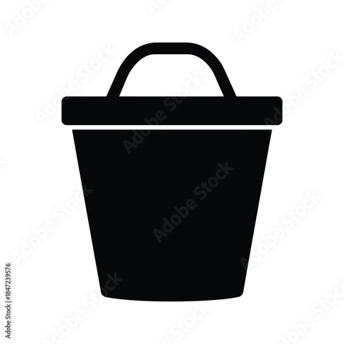 Black bucket with handle creates a simple shopping icon on a white background