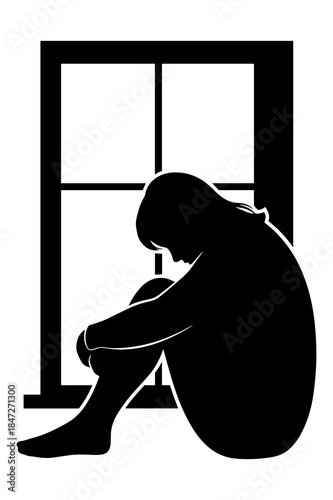 Silhouette of a person sitting alone by a window symbolizing sadness and isolation