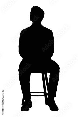 Silhouette of a man sitting on a tall stool looking upward against white background