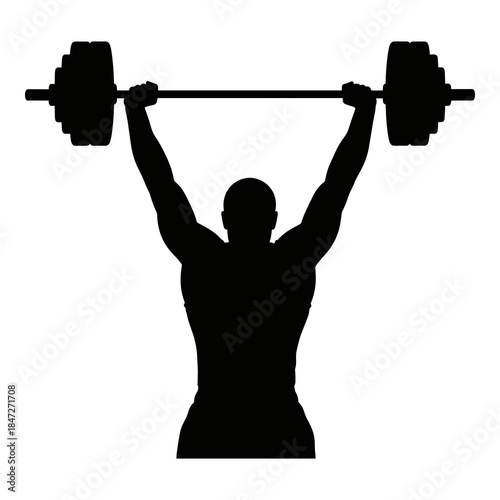 Silhouette of strong athlete successfully lifting heavy barbell overhead in gym workout