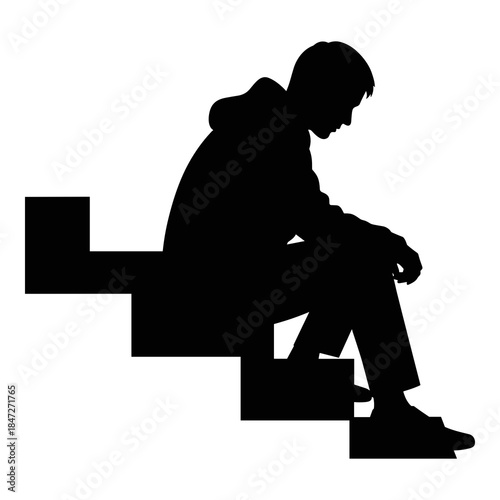 Silhouette of a lonely person sitting sadly upon dark concrete steps outdoors