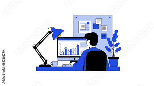 Business Analyst Working on Computer with Growth Charts