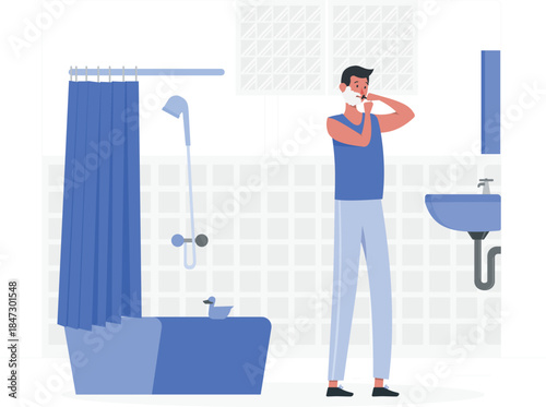 Man standing in a modern bathroom with blue fixtures, brushing his teeth in front of a sink