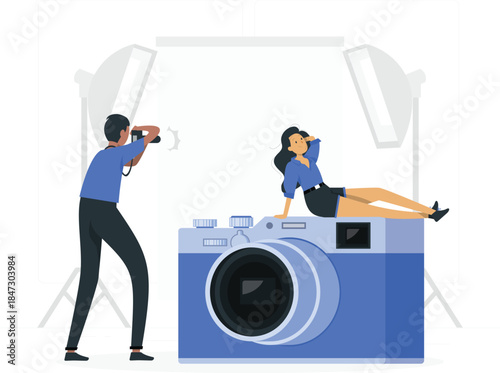 Photographer taking portrait in studio