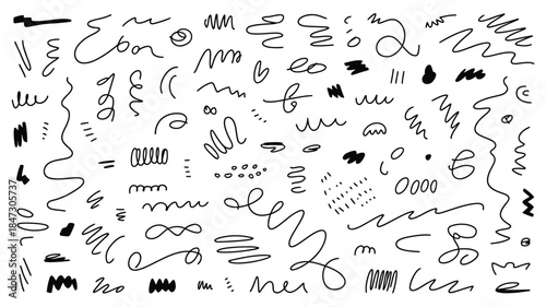 A large assortment of hand drawn black squiggles, lines, dashes, and other random doodles