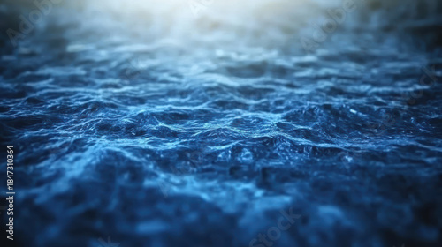 Fototapeta Naklejka Na Ścianę i Meble -  Calm deep blue ocean surface with soft light reflection and gentle wave motion