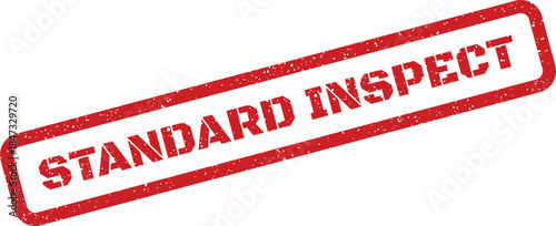 A red grunge rectangular stamp featuring the words STANDARD INSPECT for marking review status