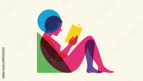 Woman sitting and reading a book in a chair
