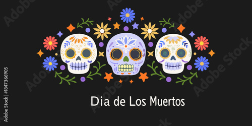 Colorful sugar skulls and floral decorations celebrate the day of the dead