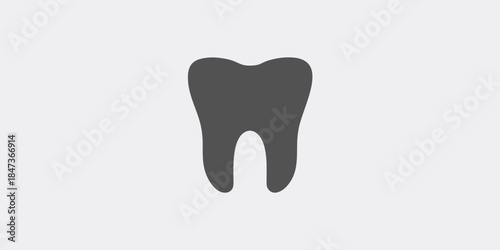 Simple illustration of a single dark tooth against a light gray background