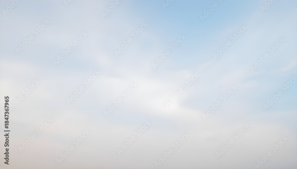 Fototapeta premium Clean soft blue sky background with gentle light clouds and lots of copy space. Suitable for minimal banners, website headers, wellness designs, and inspirational quote backgrounds.