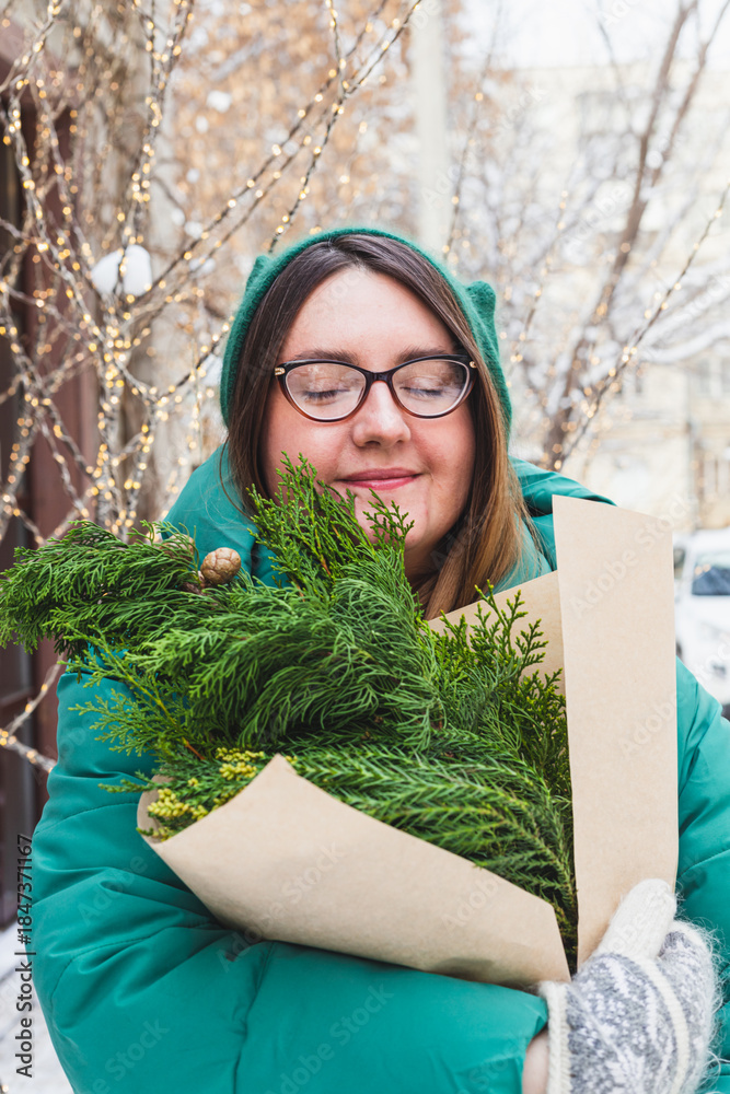custom made wallpaper toronto digitalA girl holds a bouquet with coniferous branches