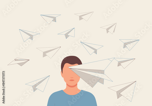 Person with paper airplanes flying around their head, one obscuring their eye.