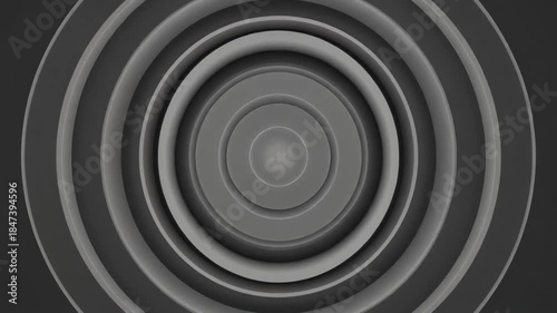 Gray concentric circles on dark background