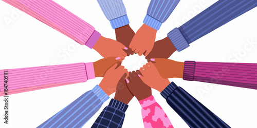 Diverse hands joining together in a circle symbolizing unity and collaboration