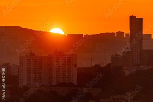 Urban development of Vladivostok at dawn. Bright dawn in Vladivostok.