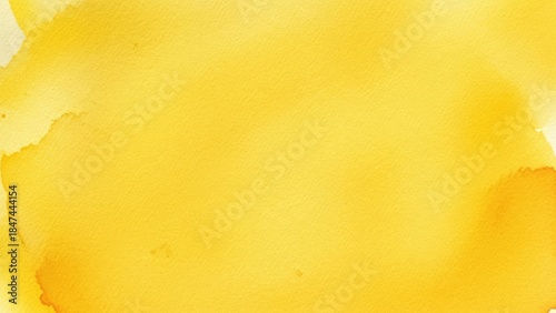 Vibrant yellow watercolor background with subtle texture and soft color variations, perfect for artistic and cheerful designs.