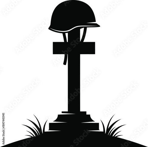 Soldier helmet on cross grave marker with grass silhouette