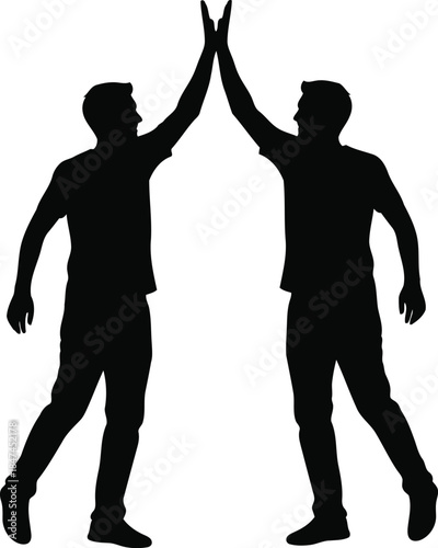 Two men silhouettes giving high five celebration success