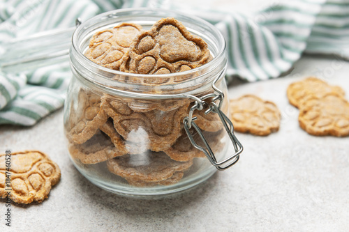 Homemade dog paw print treats in jar