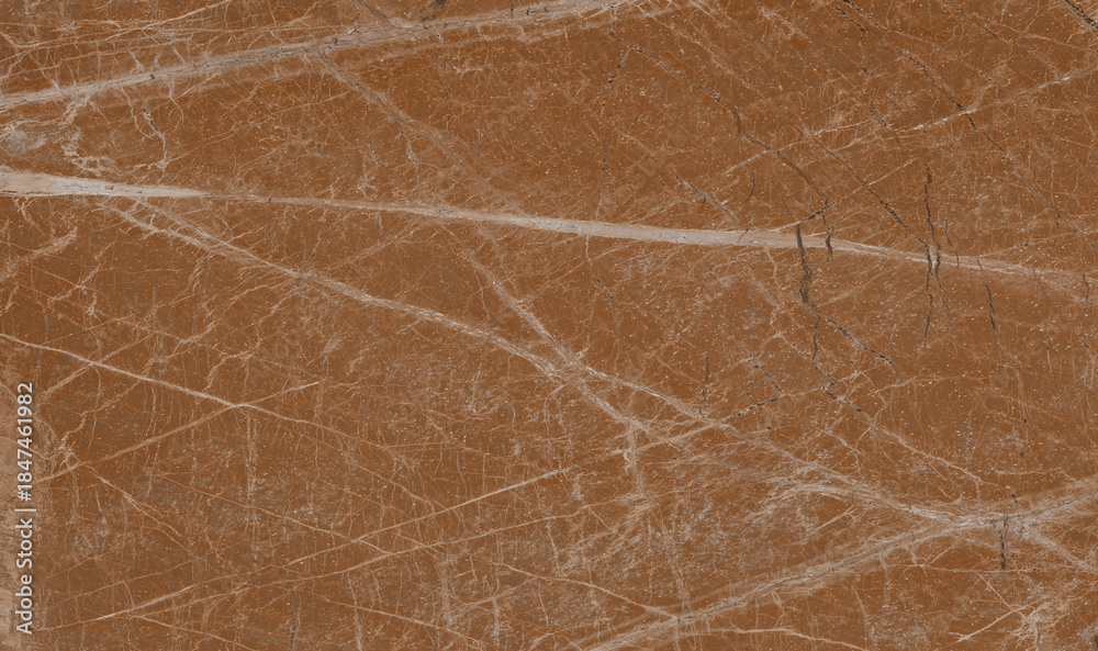 Fototapeta premium Rich brown marble surface with sharp white veins
