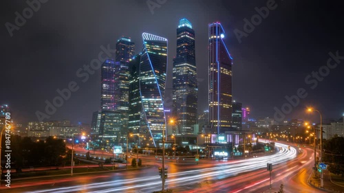 Wallpaper Mural Moscow City skyscrapers at night with light trails from cars on wet roads Torontodigital.ca