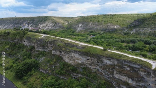 flying a drone above river in Old Orhei