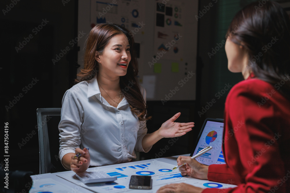 Fototapeta premium Businesswomen discussing market data during an important meeting