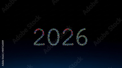 Drone light show forming the year 2026 in a gradient night sky with colorful dots arranged in a futuristic display