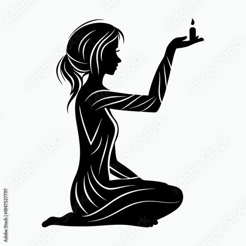 Woman holding a candle silhouette in a meditative pose on white background