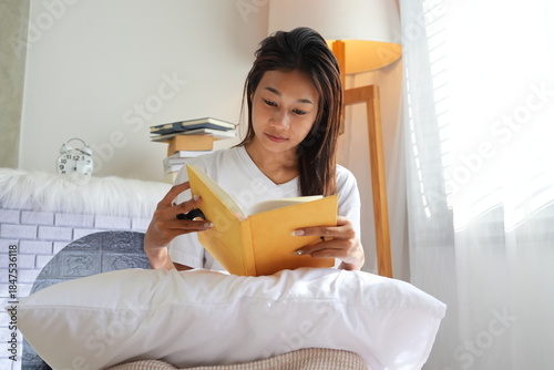 A teenage girl wakes up in the morning and does activities before taking a shower