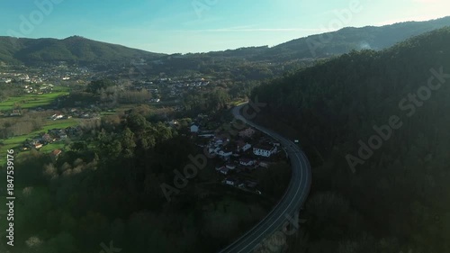 Scenic view of a motorway highway road winding through the green landscape near Arouca, Portugal. Modern transportation infrastructure connecting a European rural town
