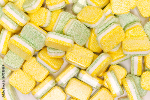 Dishwasher tablets stacked in a colorful arrangement